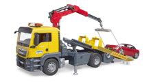 MAN TGS tow truck with roadster